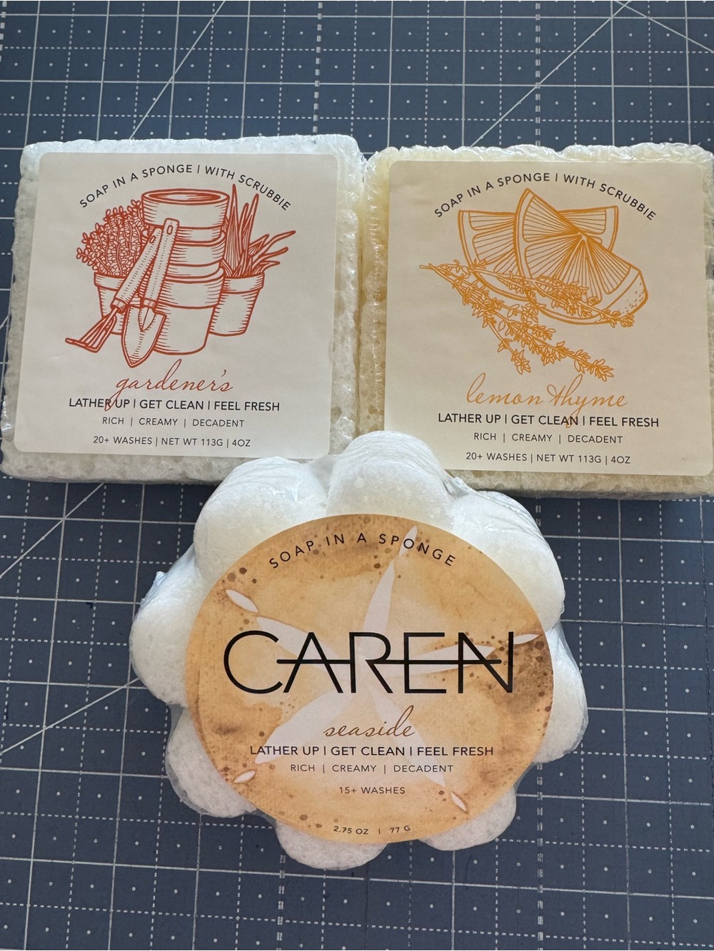 Caren Cares soap in a sponge with scrubbie! Set of 3!! New and sealed!!